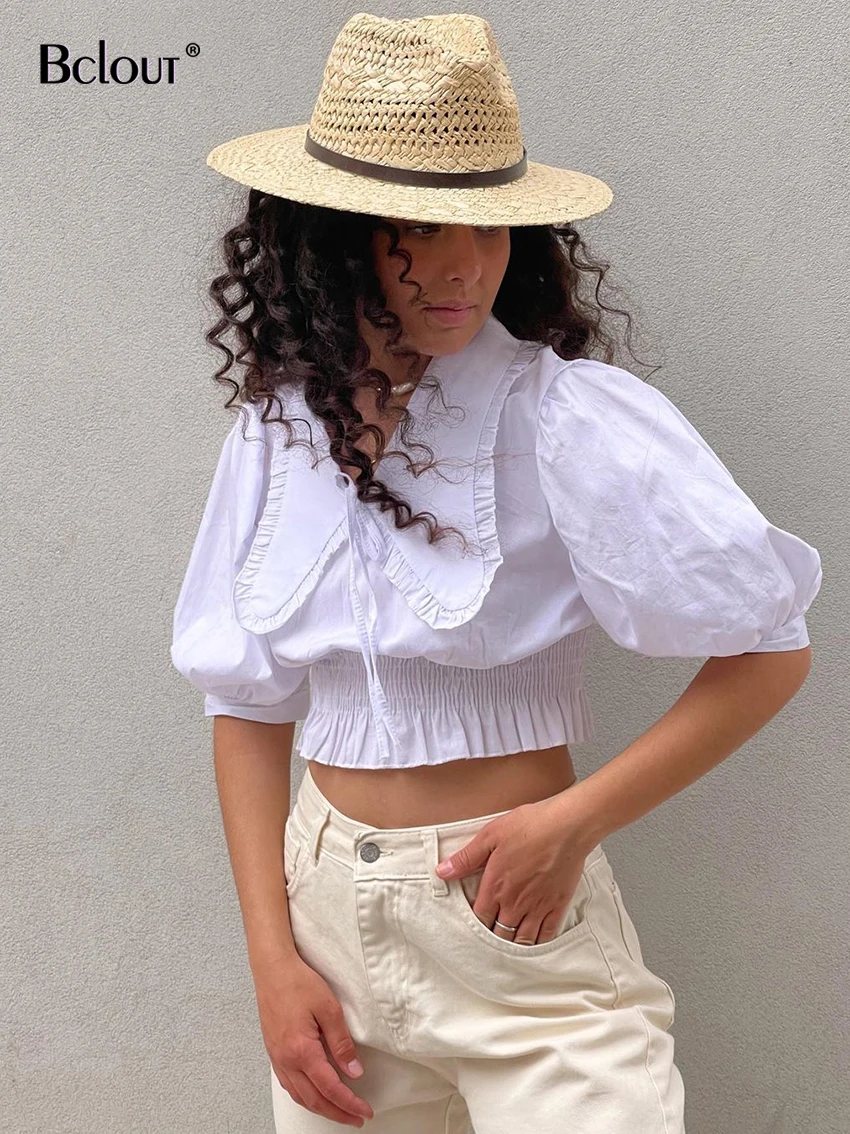 

Женский укороченный топ с рукавами-фонариками и рюшами