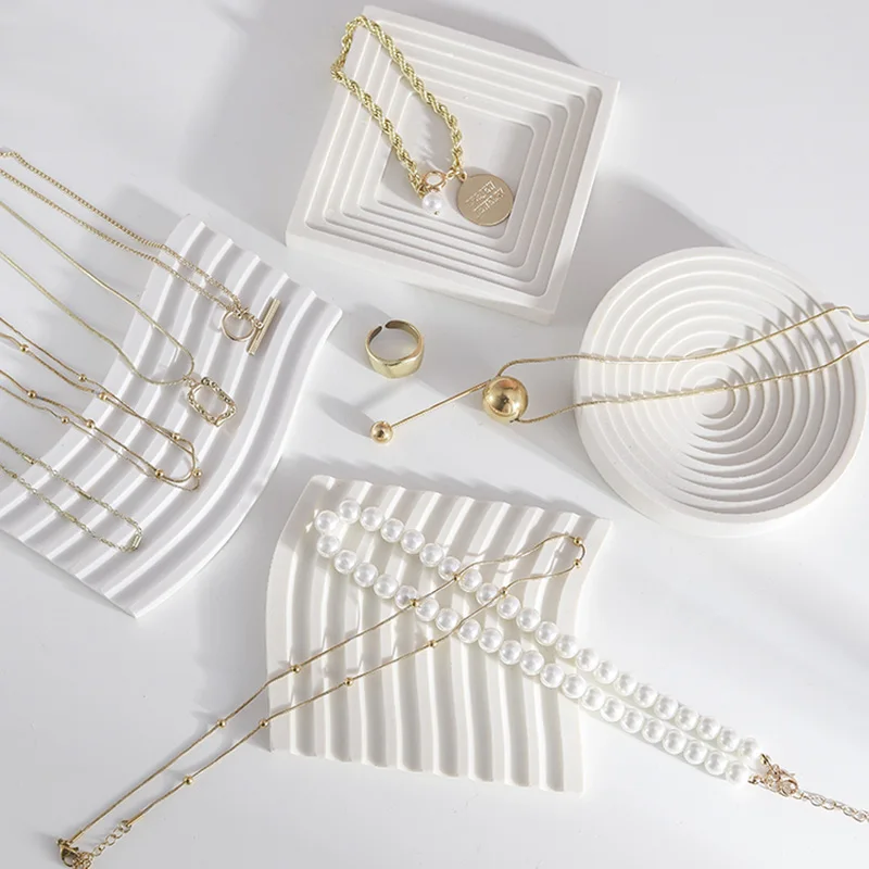 

Новое ожерелье, ювелирные изделия, креативный штукатурный демонстрационный стол, серьги, ювелирные изделия, дисплей, фото реквизит, украшен...