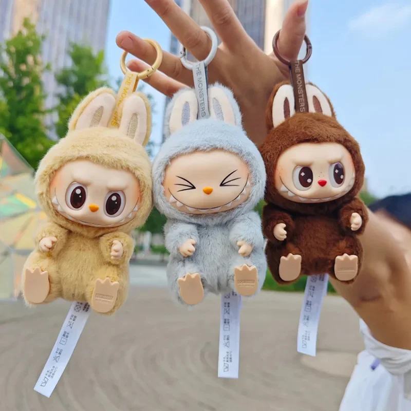 Подлинный брелок Labubu фигурка с сиденьем милый эмалированный лицо аниме модель