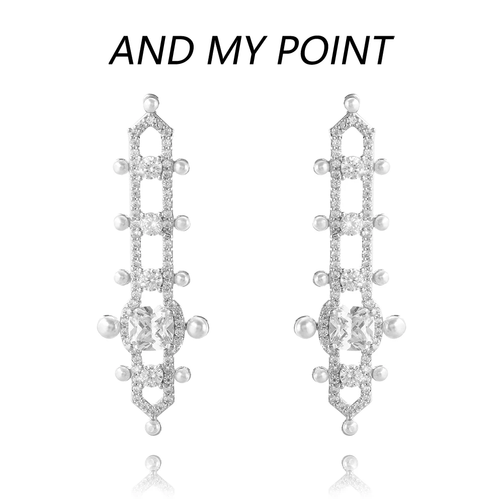 

Блестящие геометрические элегантные жемчужные серьги-гвоздики для женщин, уникальные нишевые экзотические серьги из искусственной кожи, с...