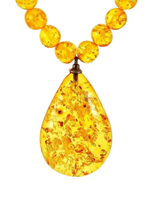 Нежное колье Лаура из лимонного янтаря с небольшой искрящейся подвеской |