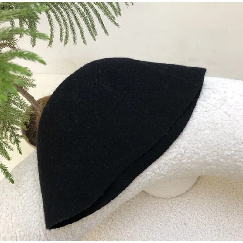 

Japanese wool felt fisher man hat women's simple classic round hat ins popular British style ball hat Tren buy dikupang