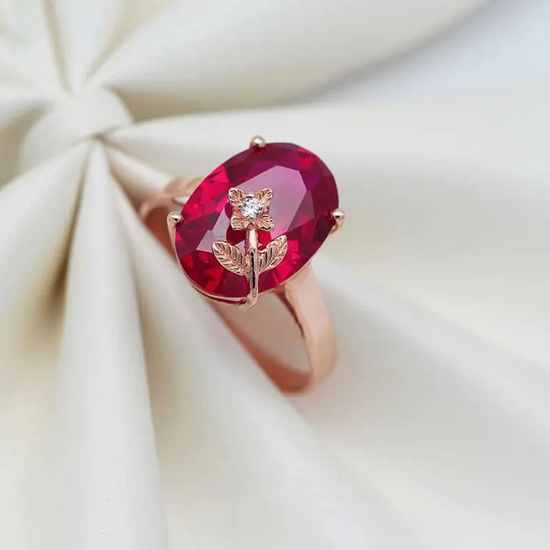 Женское кольцо из розового золота 585 пробы с овальным Рубином