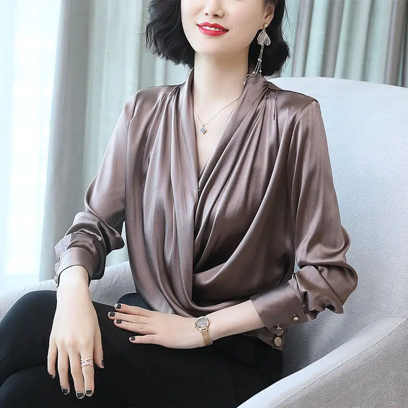 

Loose Slimming Pleated Shirt Female Button Decoration Stitching V-neck Long Sleeve Design Pullover Blouses Women 2020 Spring