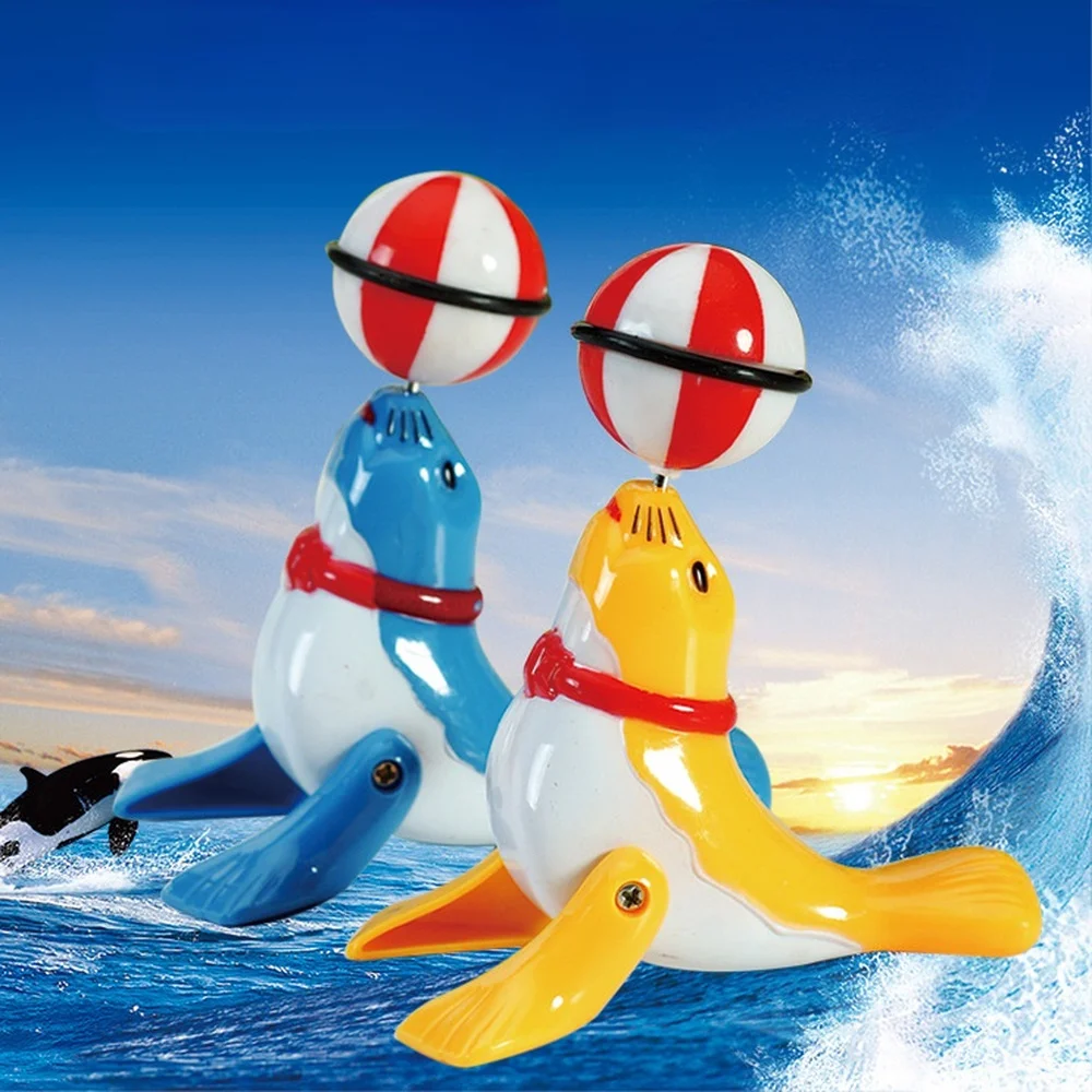 

2017 1*Plastic Clockwork Chain Cartoon Dolphin Sea Lion Wind-up Toys for Kids Funny Games Educational Toys Birthday Gifts Cute