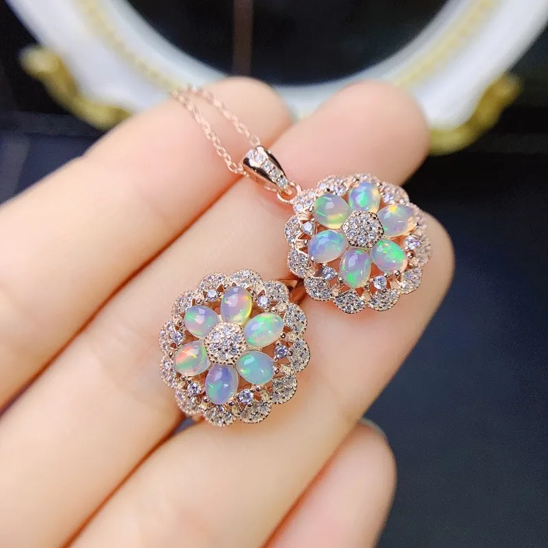 Женское кольцо с голубым опалом и кулон из серебра 925 пробы