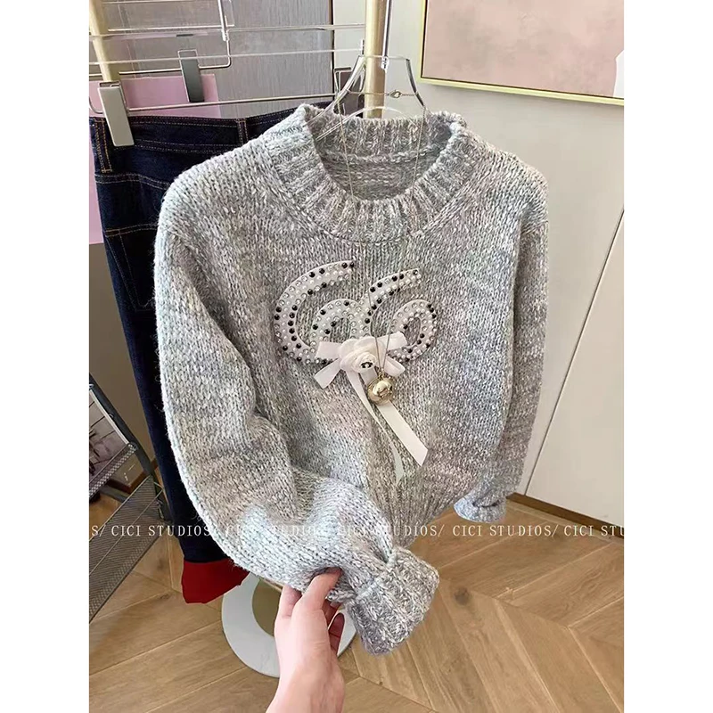 Женский трикотажный топ с круглым вырезом длинным рукавом и бусинами