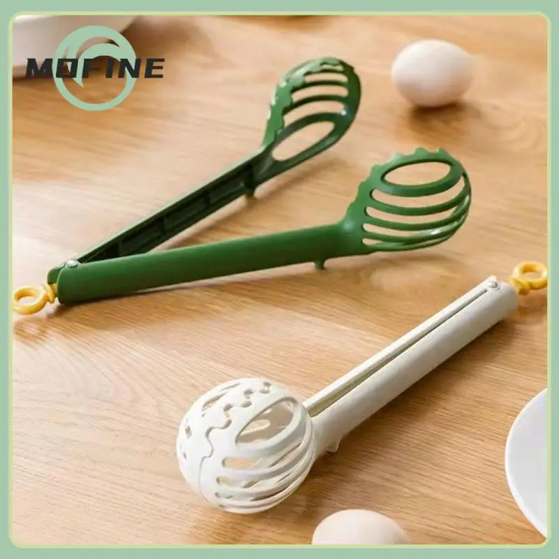 

Multifunctional Long Handle Manual Egg Beater Imitation Sawtooth Design Kitchen Egg Clip Noodle Heat Resistant Non-stick