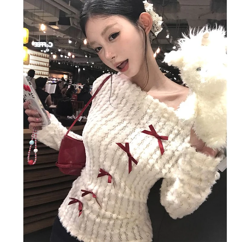 Тонкие женские пуловеры с бантом