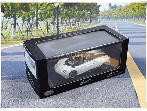 Модель автомобиля Pagani Huayra Roadster 1:43 синего цвета