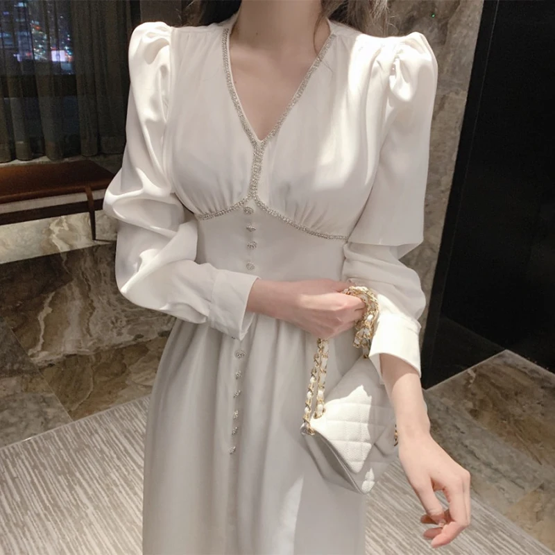 

2021 New Korean chic temperament V-neck chic edging single breasted pleated waist mid length bubble sleeve dress