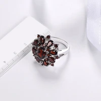 hot sale classic silver color inlaid garnet red zircon flower shape ladies banquet ring jewelry whole sale