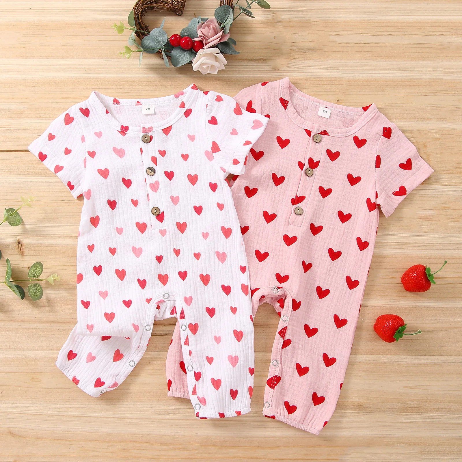 

Lioraitiin 0-18M Newborn Baby Girls Valentine's Romper Toddler Love Heart Print Short Sleeves Button Jumpsuit Summer Clothes