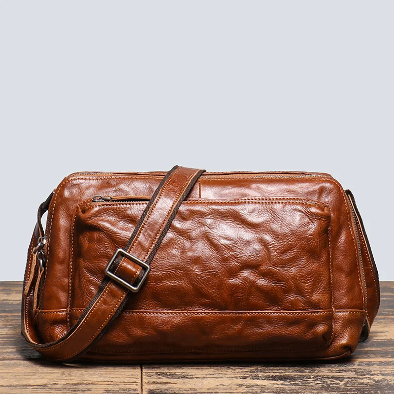 

Vintage Personalized Genuine Leather Men's Bag Cowhide One Shoulder Postman Hand Grab Pattern Large Capacity Crossbody