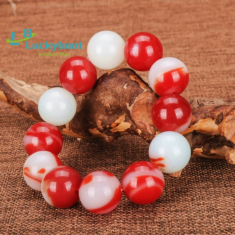 

Xinjiang Hetian jade gold silk jade chicken blood floating flower Gobi jade bracelet men and women braceletacc essories