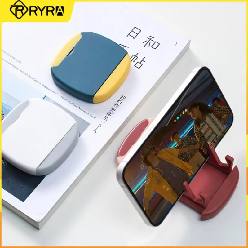

RYRA Multifunctional mobile phone holder with Cleaner Brush Kit Tools/Mirror For Headset Keyboard Cleaning 3-in-1 portable stand