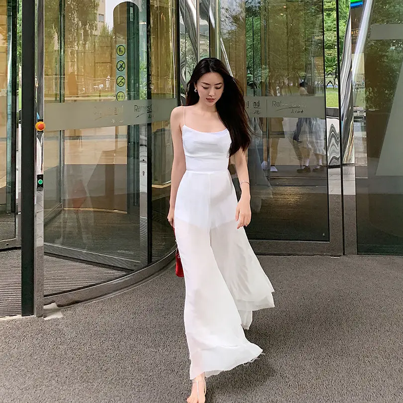 

Women 2022 Summer New Solid Sleeveless Straps Jumpsuits Female Wide Leg Trousers Loose Rompers Ladies Casual Long Pants E103