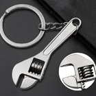 Автомобильный металлический ключ, стильный брелок для ключей, креативный модный подарок, серебряный компактный брелок для ключей, подвеска амортизатора тормозного диска