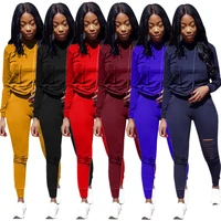 european and american womens fashion solid color burning flower hooded sports suit leisure two piece suit
