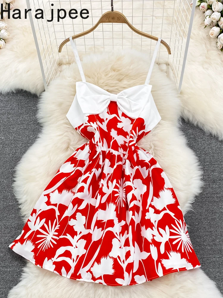 

Женское летнее платье с V-образным вырезом и бантом