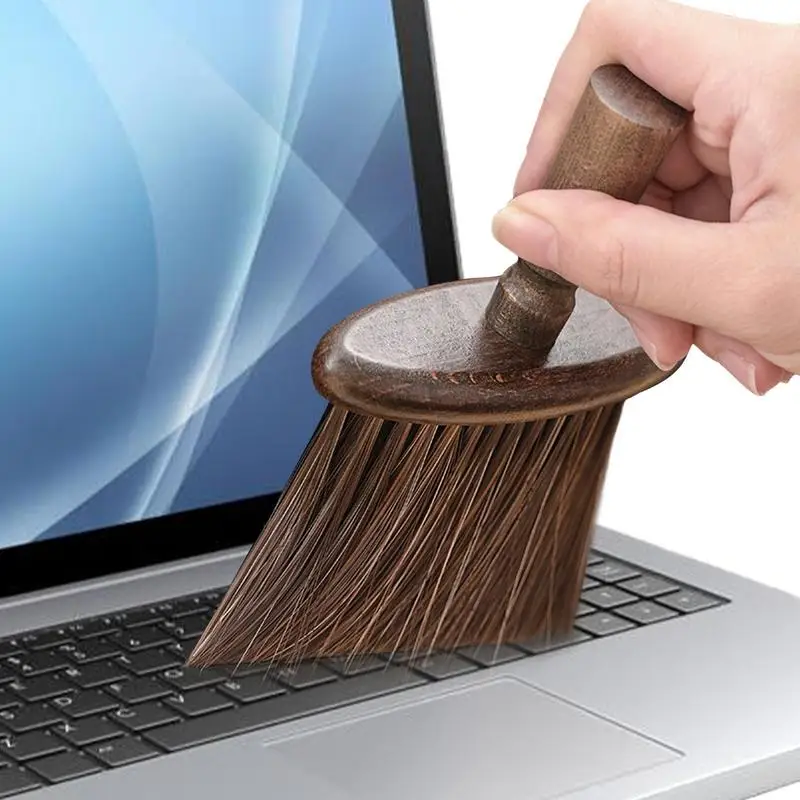 

Деревянный инструмент для чистки клавиатуры настольного компьютера