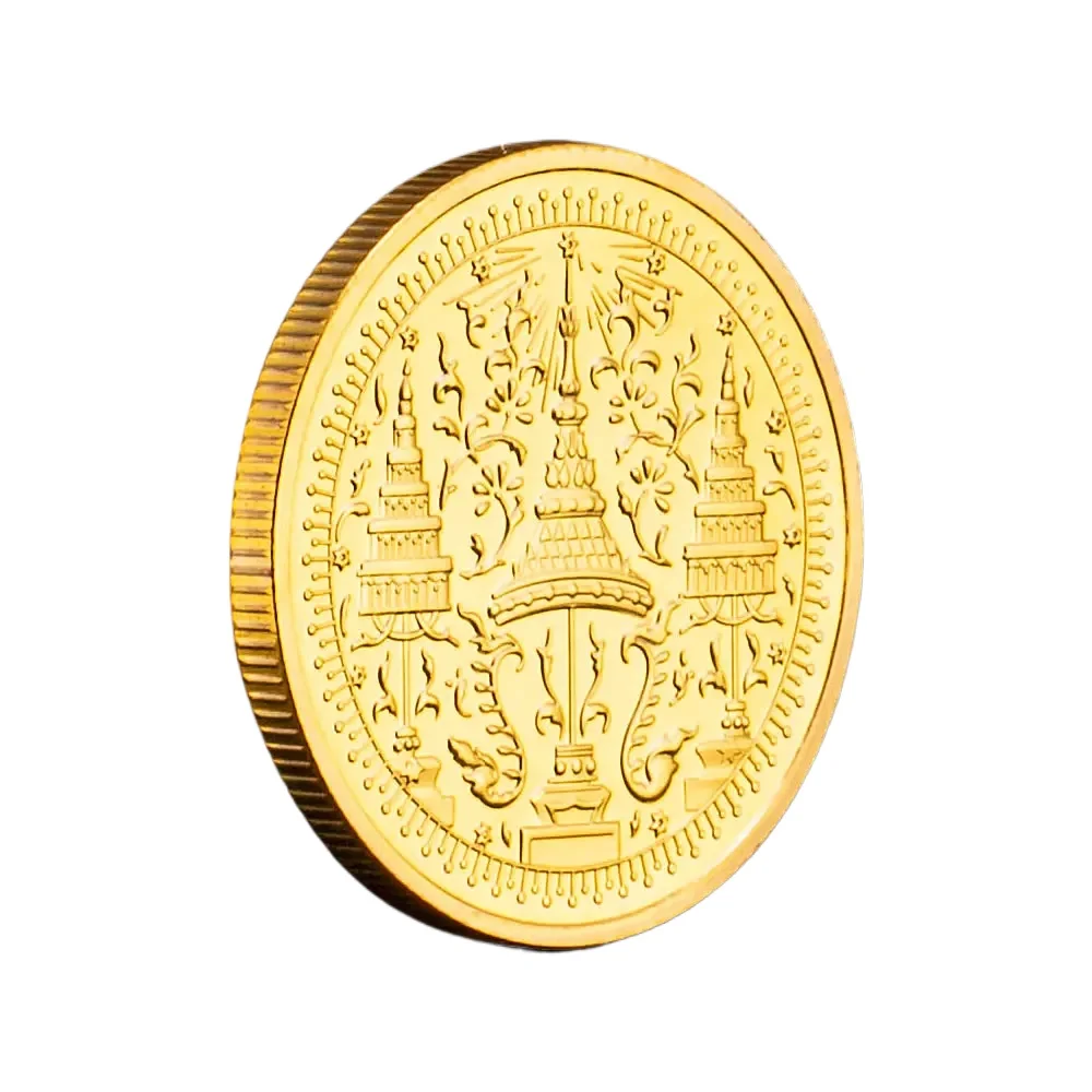 

Золотая позолоченная монета с изображением слона