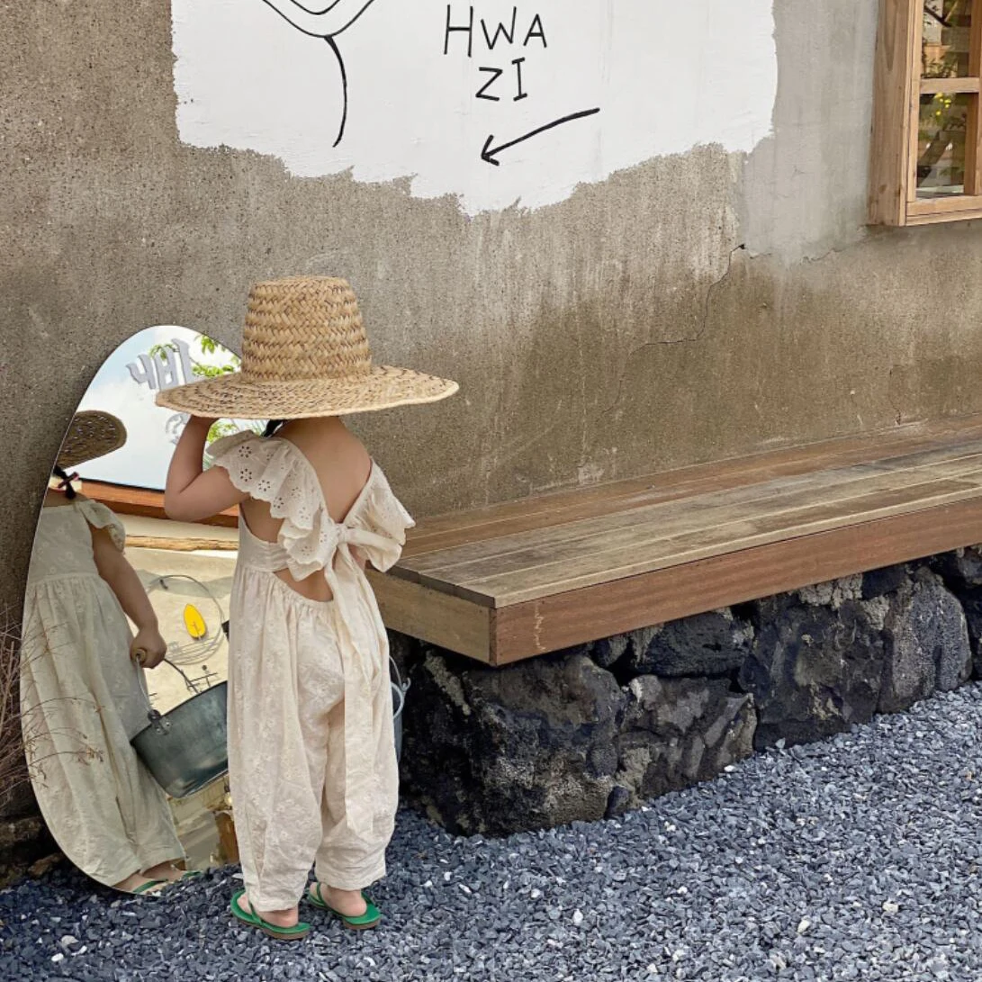 

Детский комбинезон с цветочной вышивкой, с бантом на спине