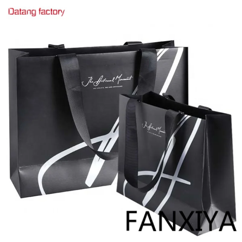 

Luxury sac de course packing bag Custom logo gift bag glossy clothes branded retail shopping paper bags with rope handles