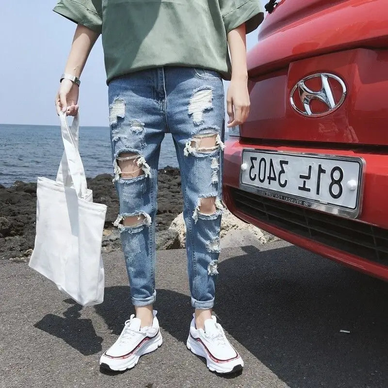 Korean version trend spring loose ripped jeans men's ninth pants light color slim fit