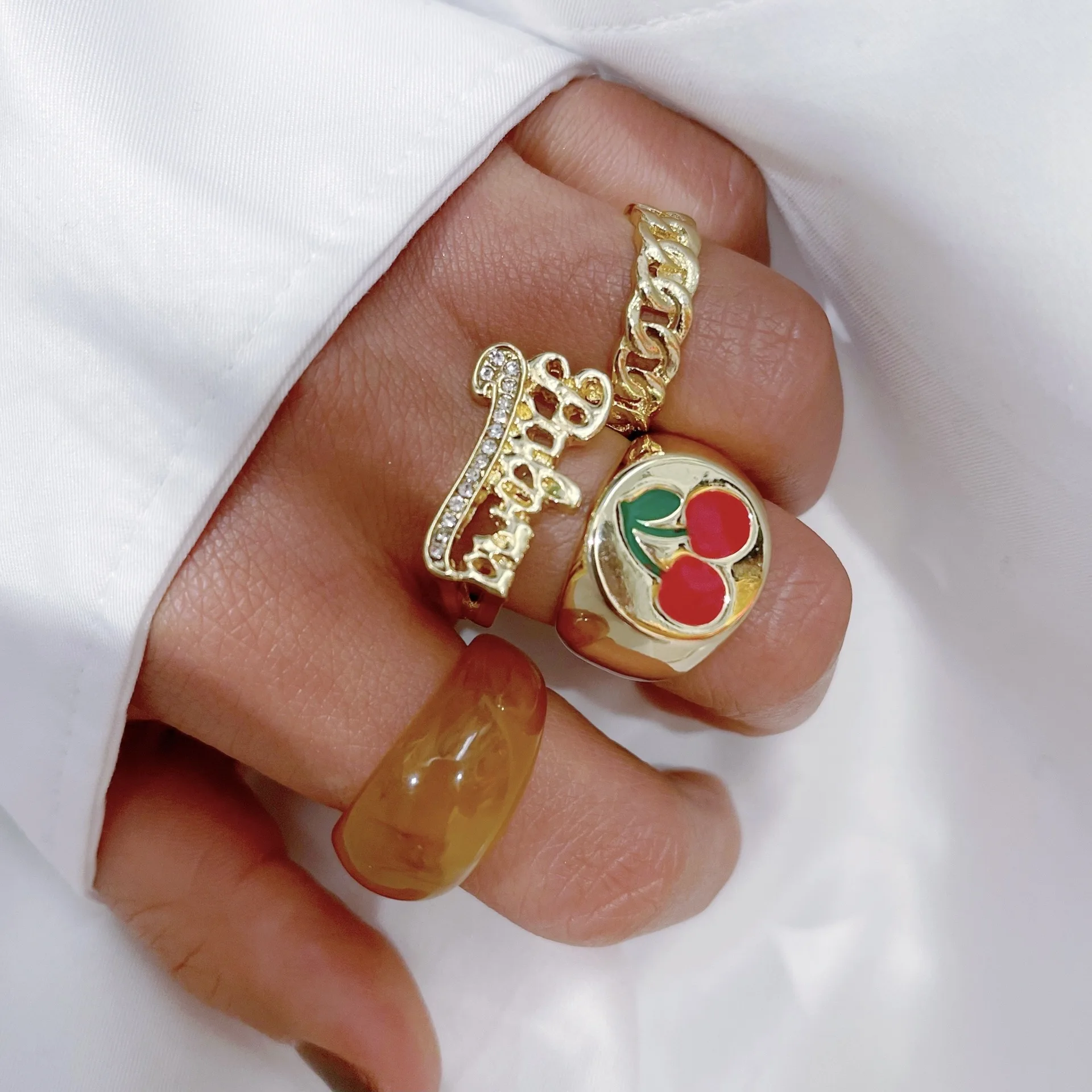 

Geometric irregular exaggerated ring cherry simple ring