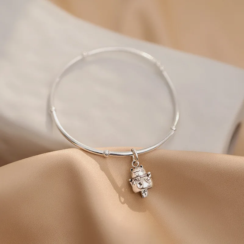 

Женский браслет из серебра 925 пробы с подвеской-кисточкой