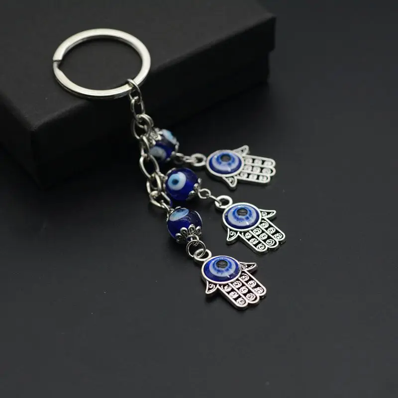 

Fatima Hamsa Hand Evil Eye Pendant Keychain Lucky Eye Glass Bead Tassel Hanging Key Chain Bag Car Keyring for Women Men Jewelry