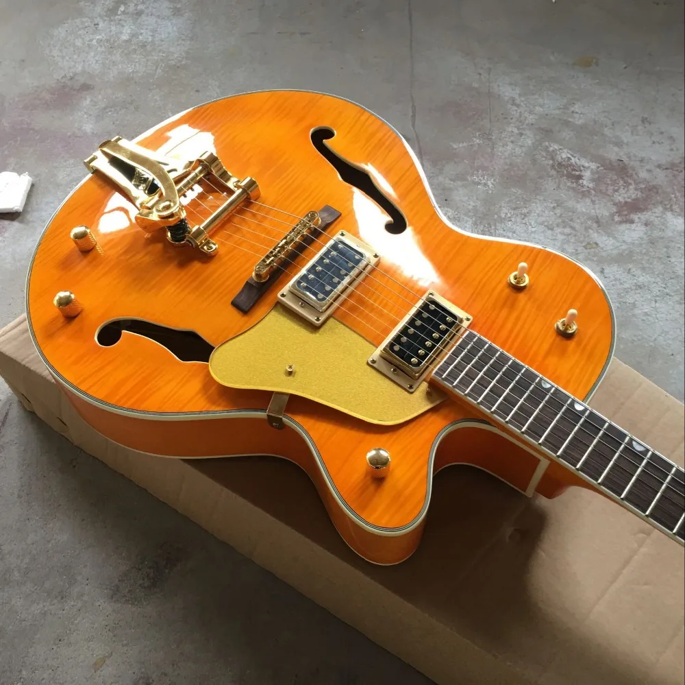

custom shop jazz electric guitar Hollow body jazz gitaar.orange color tiger flame top.vibrato system