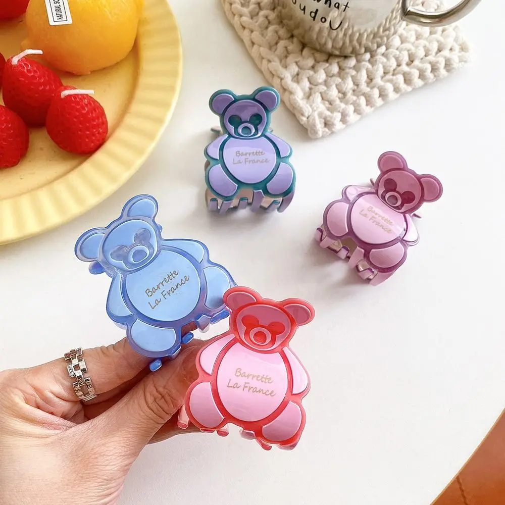 

Заколка для волос в виде кошек и акул