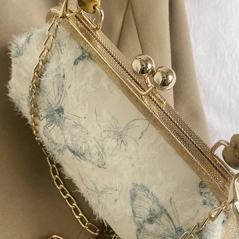 Женская сумочка на цепочке с принтом в виде бабочек