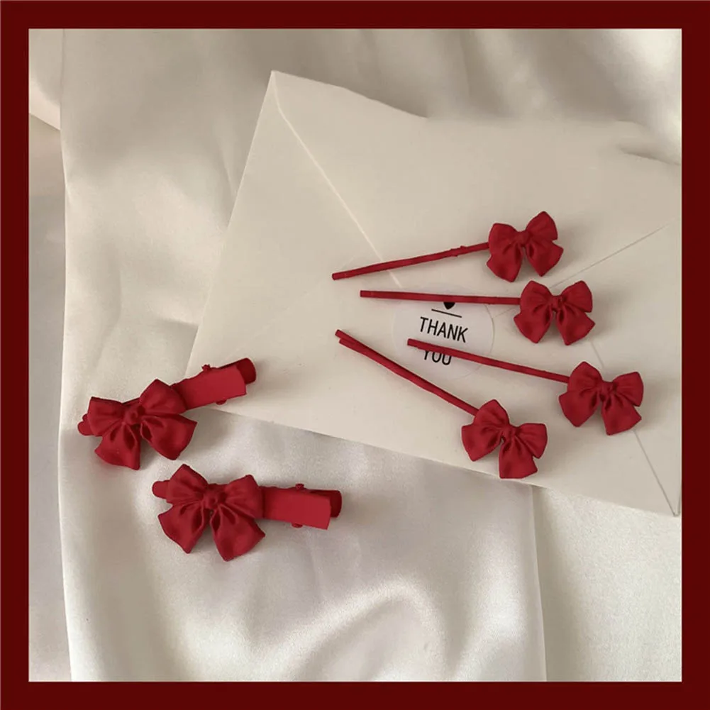 

Заколка для волос в японском стиле женская, простой и милый зажим с красным бантом, модные аксессуары для волос, инструменты для укладки, 1 шт...