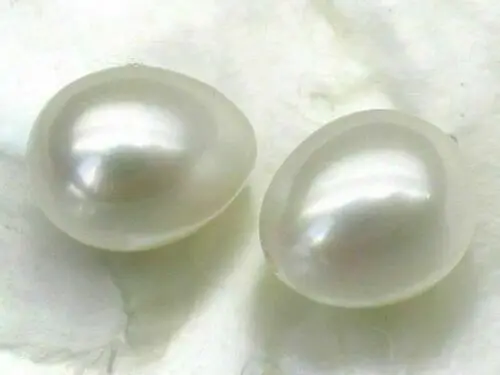 

Genuine Match Pair 8*10mm AAA+ white Loose Half Drilled Drop Akoya Pearls