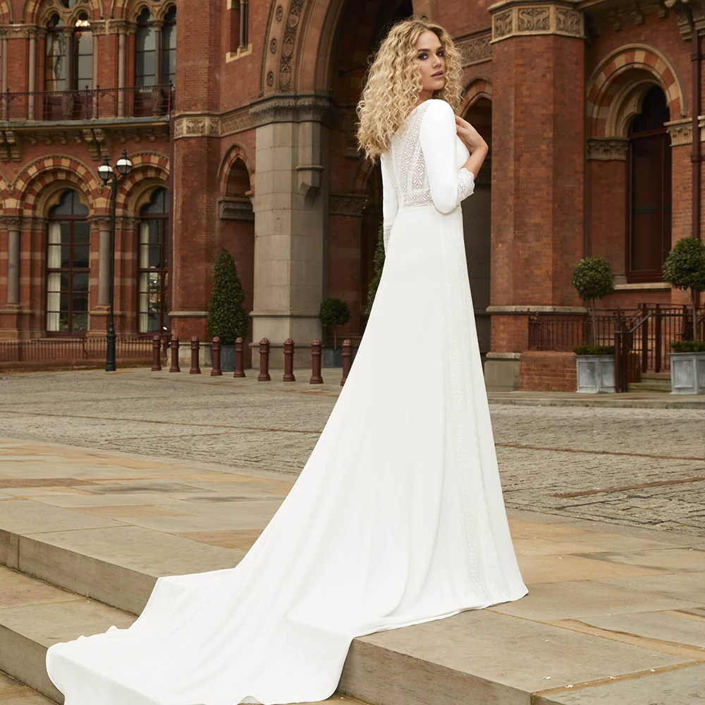 

Платье свадебное кружевное ТРАПЕЦИЕВИДНОЕ с круглым вырезом, рукавом и аппликацией