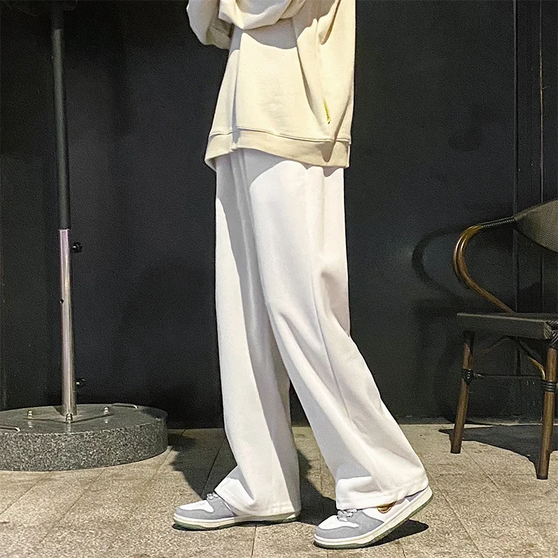 

Брюки спортивные мужские с широкими штанинами, модные повседневные штаны, уличная одежда, свободные прямые штаны, спортивные джоггеры, черн...