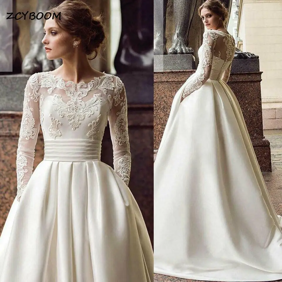 

Elegant Ivory Lace Appliques Satin A-Line O-Neck Wedding Dresses Illusion Long Sleeves Pleat Sash Bridal Gowns With Sweep Train