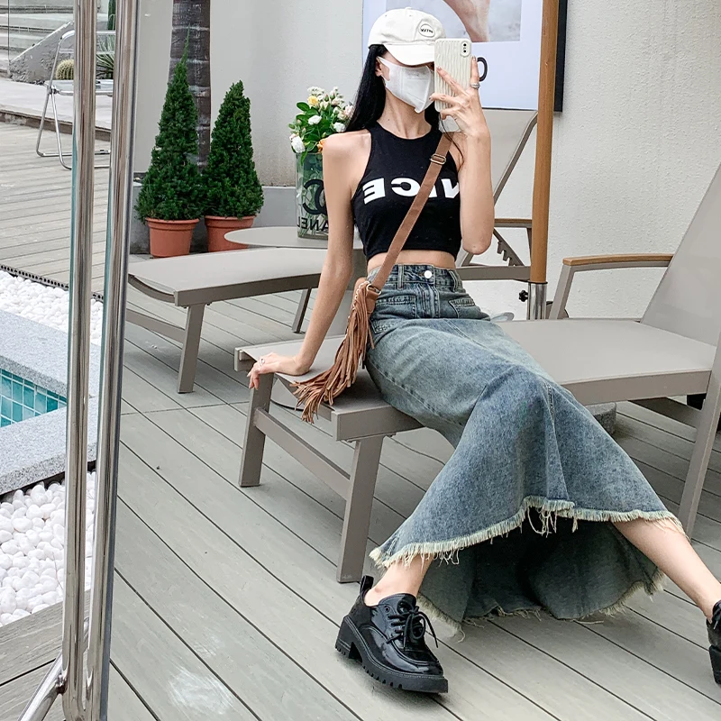 Denim skirt women's summer blue long skirt commuting new 2023 Korean version high waist niche loose bag hip raw edge fishtail