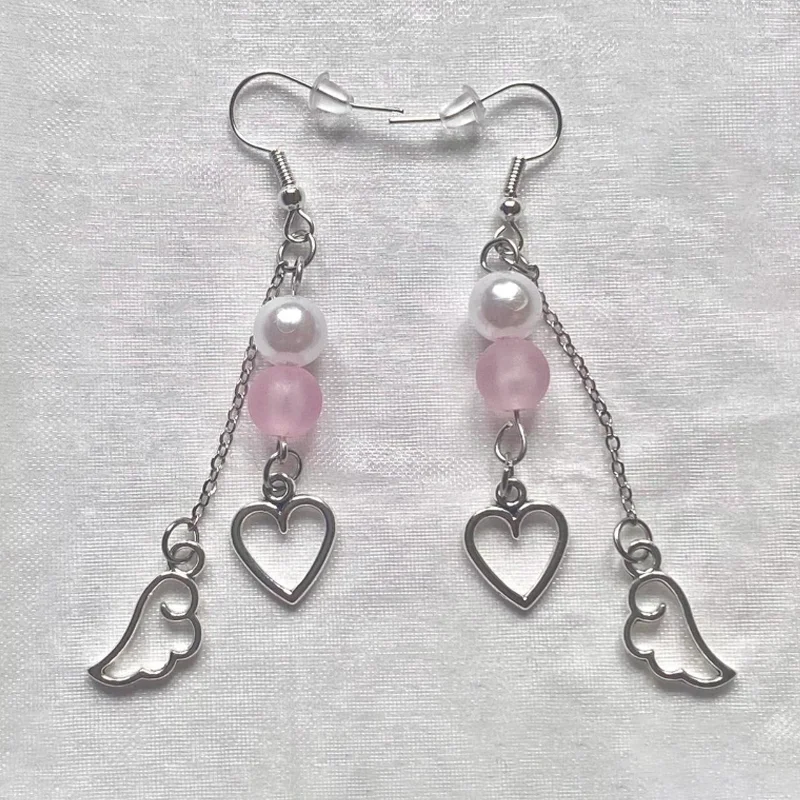 Розовые серьги из бисера подвески в виде крыльев украшения стиле бохо