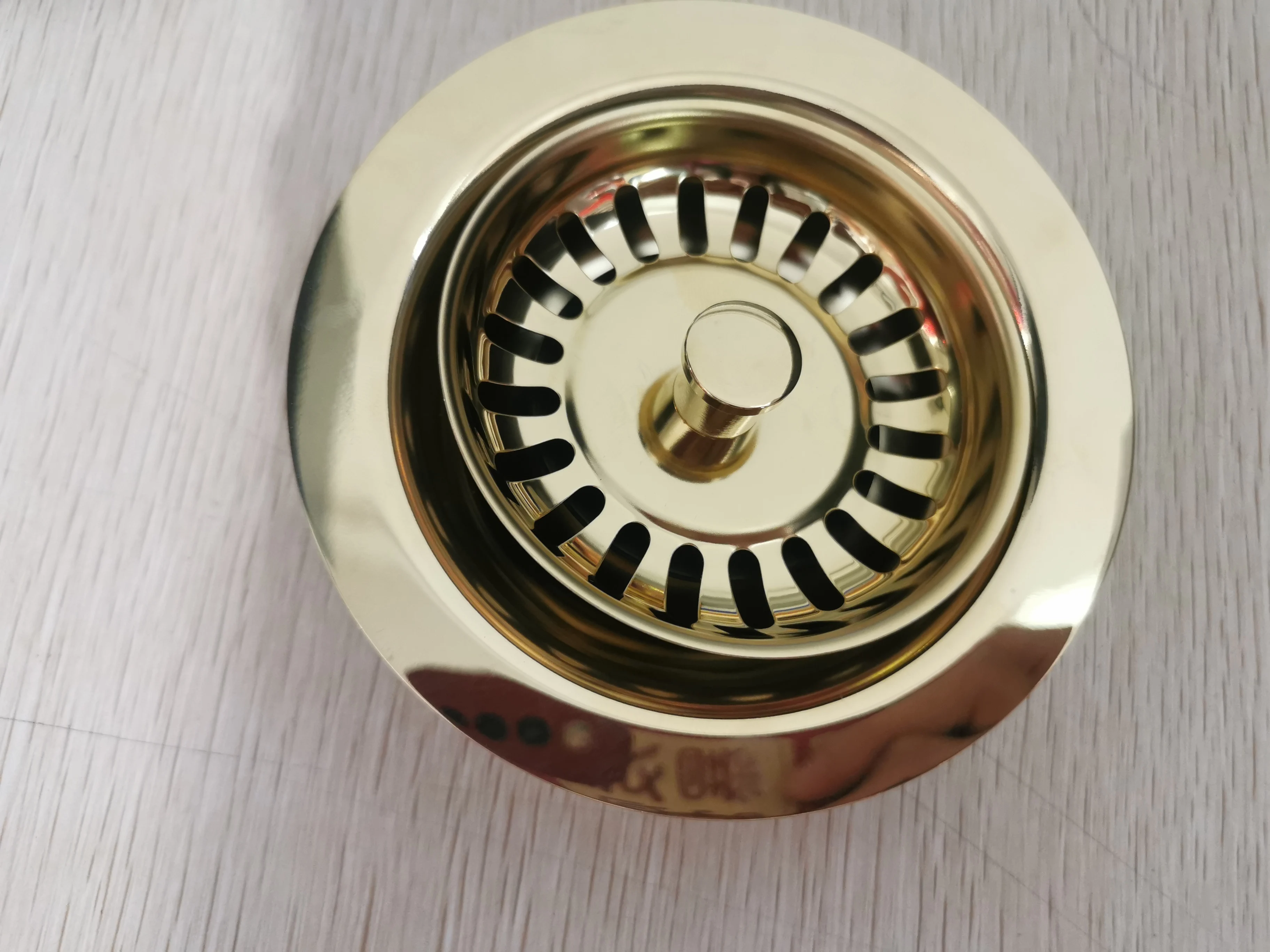 

TALEA light gold strianer filter