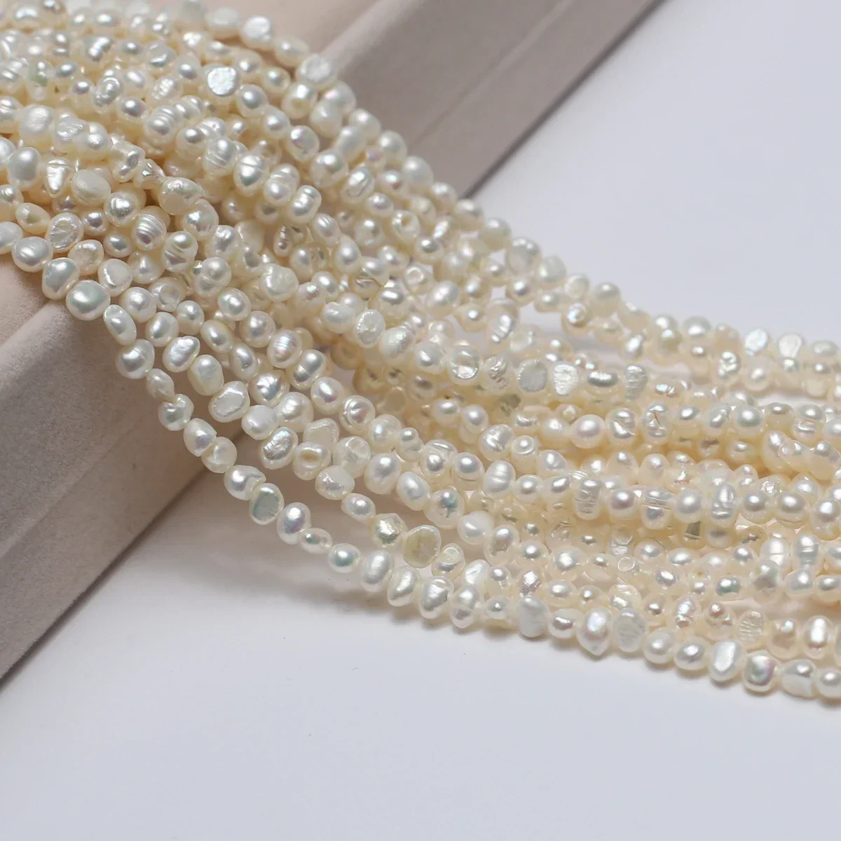 Натуральный пресноводный жемчуг 3-4 мм неправильной формы свободная прокладка