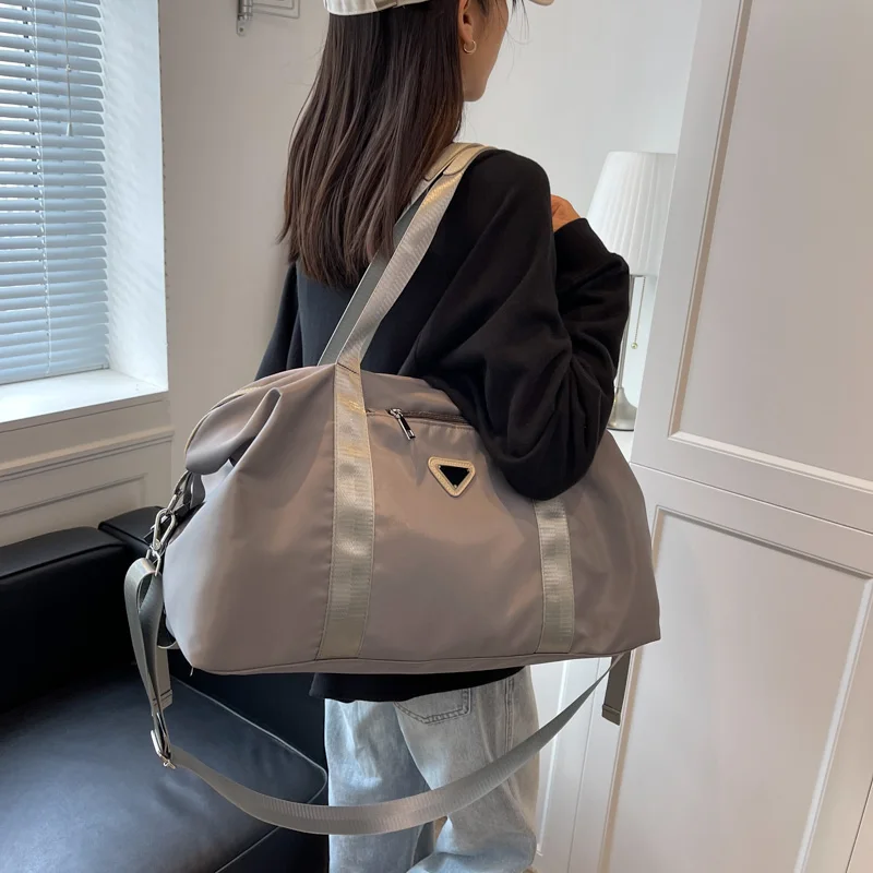 YILIAN Large capacity 2022 new niche travel bag with one shoulder, diagonal body, large bag, premium casual commuter tote bag