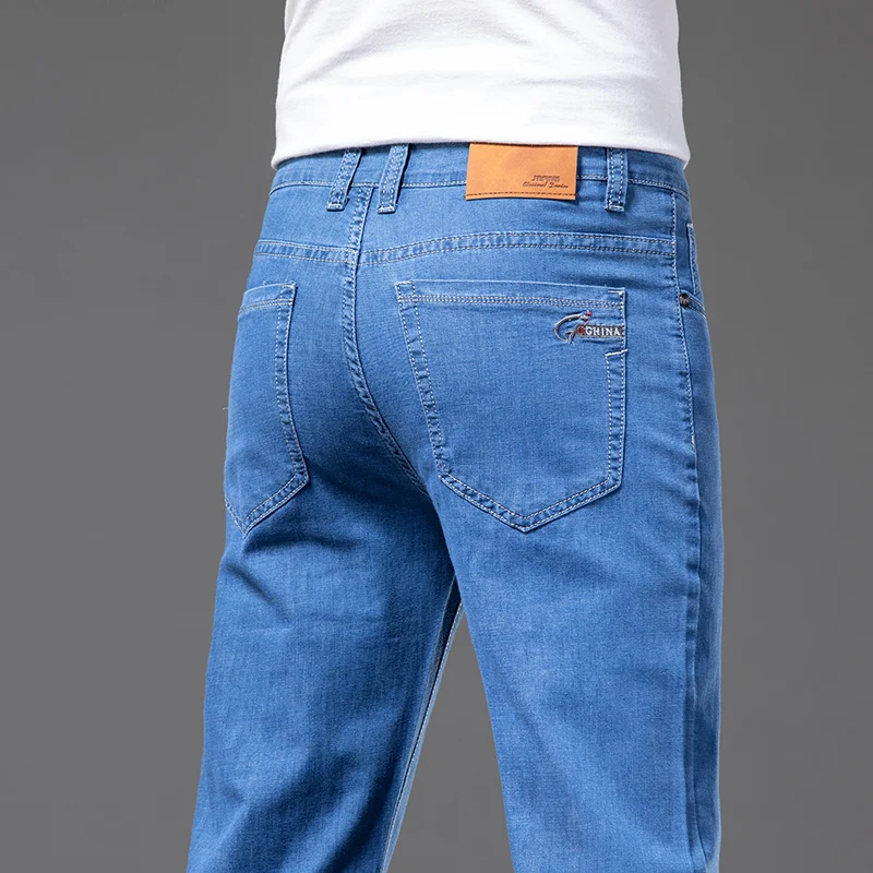 

Men'S Plus Size Black Thin Jeans 2022 Spring Summer New Loose Straight Stretch Pants Fashion Male High-End Brand Denim Trousers