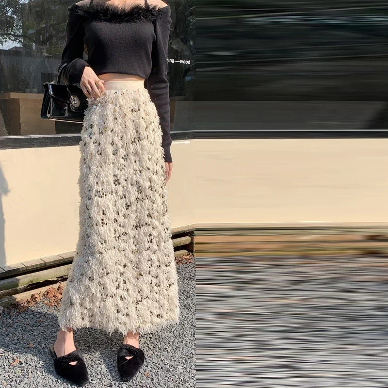 Женская длинная юбка с кисточками и пайетками