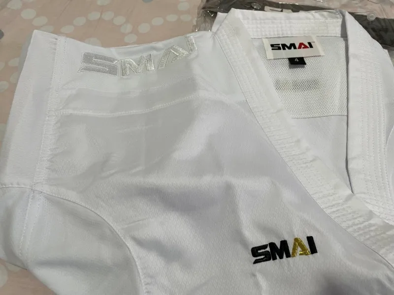 Фото Официальное обозначение карате GI SMAI Kumite WKF утвержден kumite Master K1 Премьер-лига каратэ GI Униформа используется для соревнований №4
