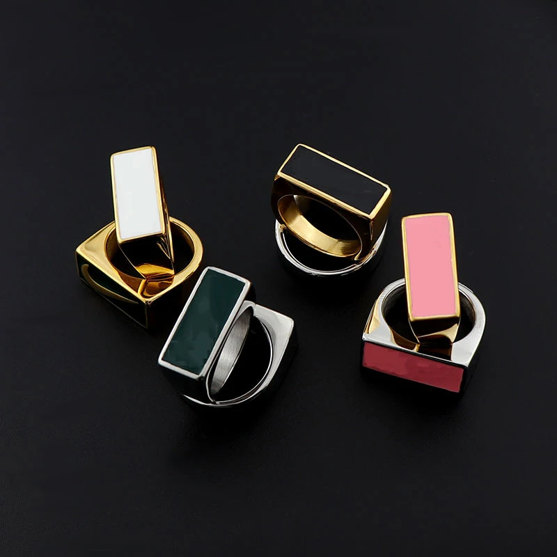 

Logo Ring New Hip-Hop Men And Women Titanium Steel Personality Simple Four-Color Hook Street Style Titanium Steel Ring Wholesale