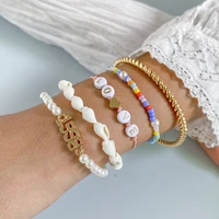 creative digital imitation pearl mixed with punk bracelet and fried dough twist ring shell jewelry